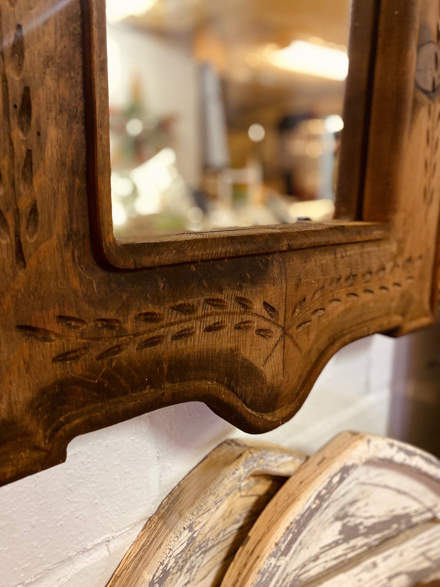 Ornate carved wood mirror