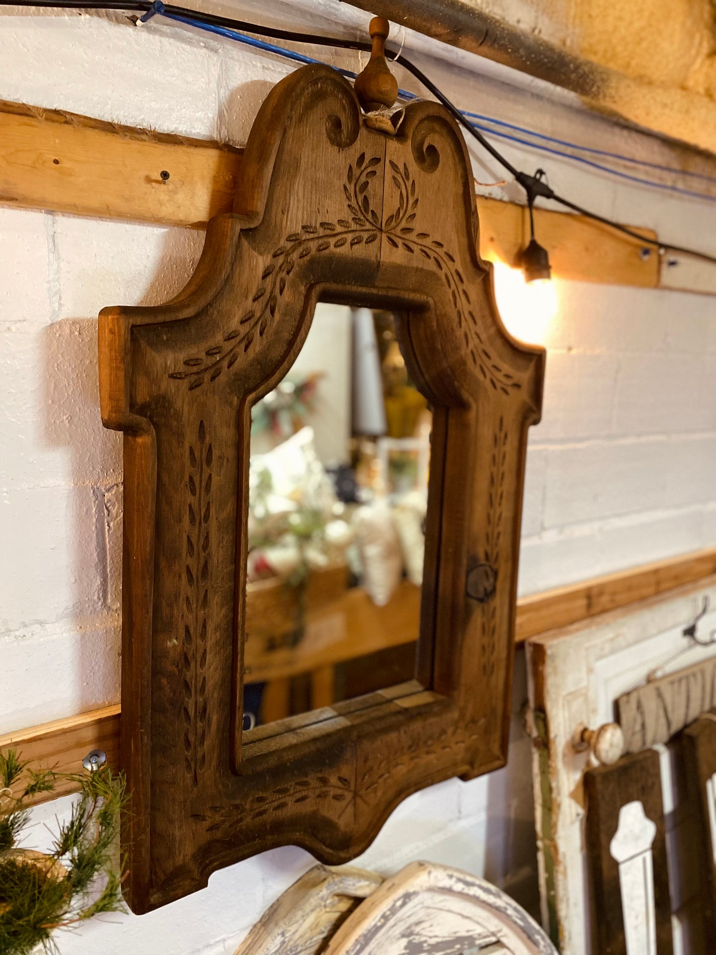Ornate carved wood mirror